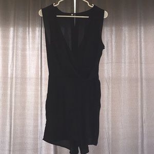 Black V neck romper with pockets!